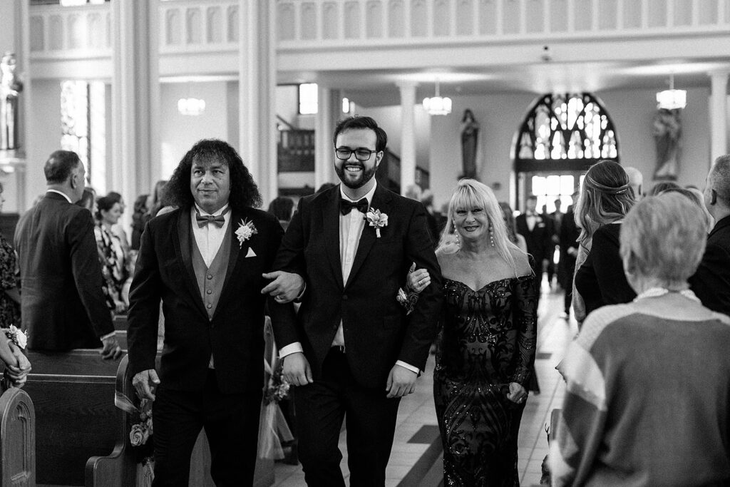 church ceremony entrance,  groom walking down the aisle